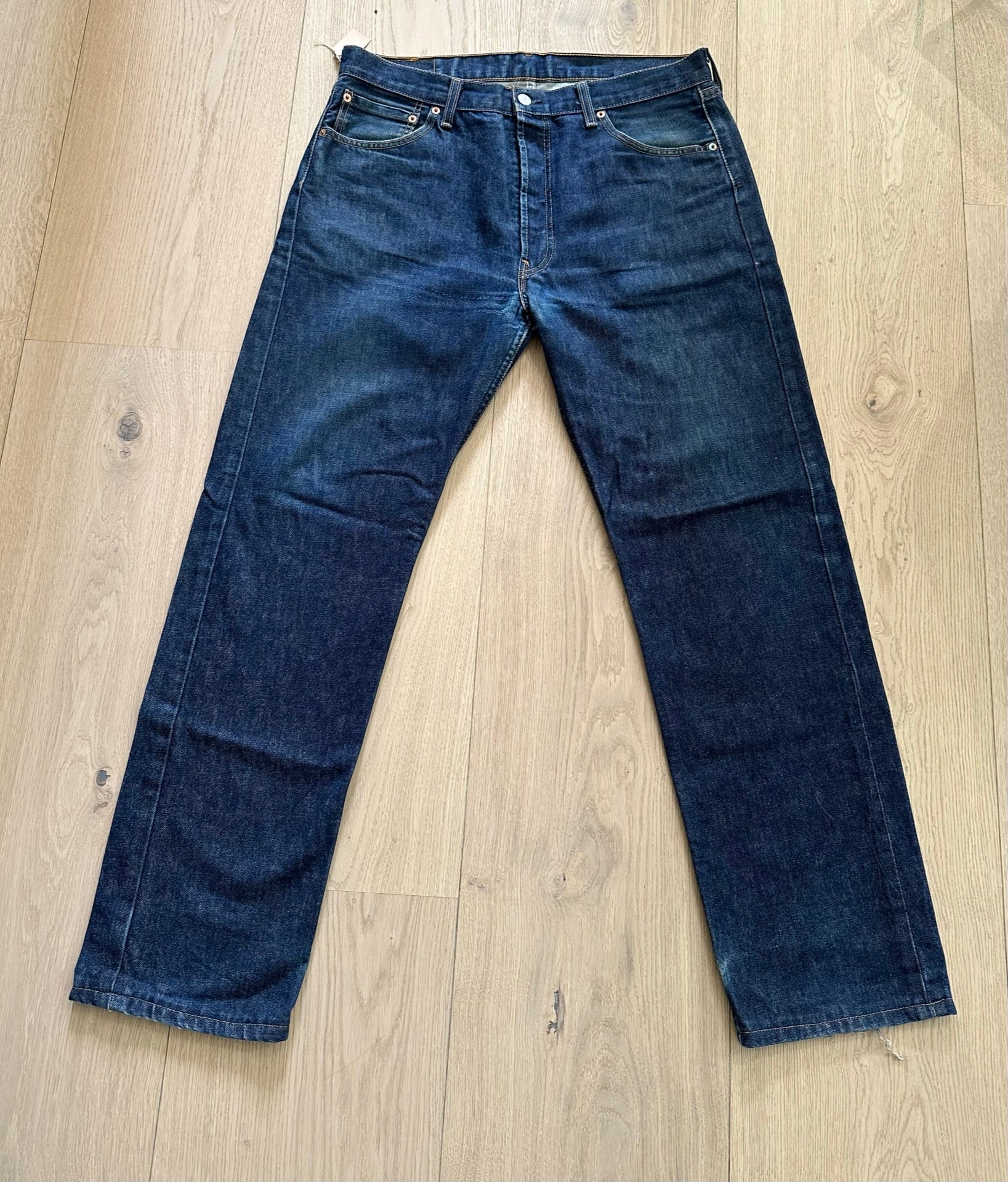 Vintage Y2K Levi's 501 Dark Wash Jeans Laid Flat