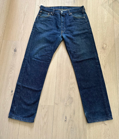 Vintage Y2K Levi's 501 Dark Wash Jeans Laid Flat