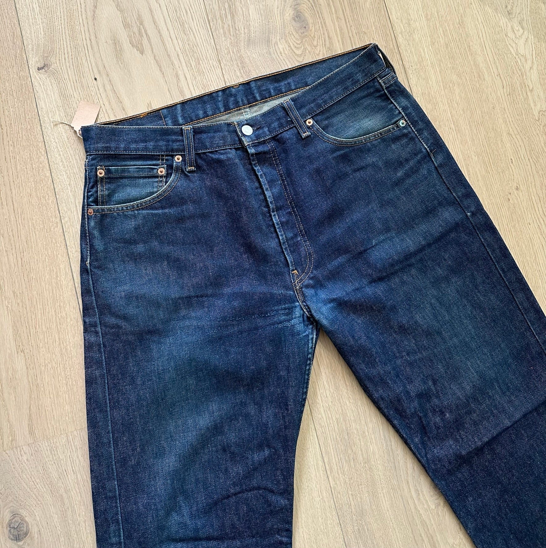 Vintage Y2K Levi's 501 Dark Wash Jeans Laid Flat Close Up